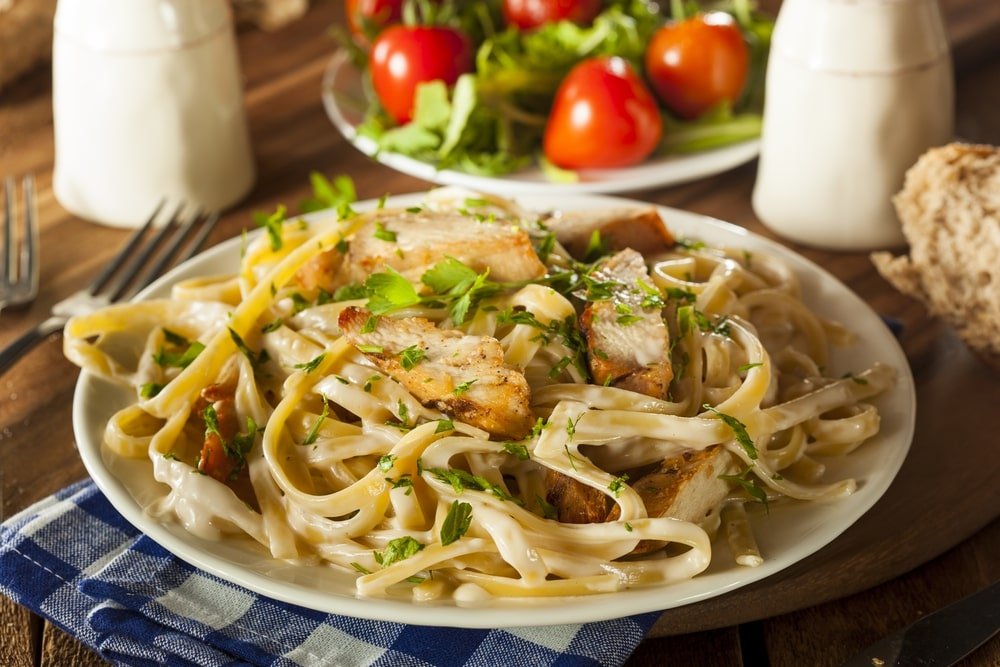 How To Make The Chicken For Chicken Alfredo : Add milk, broth, and ...